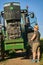 Farmer repairing his tractor