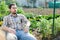 Farmer resting after work on the field