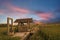 The farmer`s hut beside the well in the middle of the rice fields