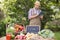 Farmer selling organic veg at market