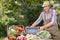 Farmer selling organic veg at market