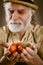 Farmer shows his biological vegetables