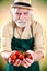 Farmer shows his biological vegetables