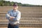 Farmer standing on farming land