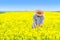 Farmer Standing in Oilseed Rapeseed Cultivated Agricultural Field