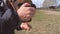 Farmer strokes the horse nose and shows his teeth. Checking the teeth of a thoroughbred horse.