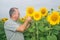 Farmer on a sunflower field