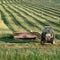 Farmer on tractor in field