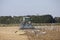 Farmer with tractor plows field in late summer on countryside of lower saxony in germany