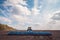 Farmer in tractor preparing farmland the next year