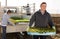 Farmer unloading lettuces seedlings