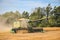 Farmer using a combine to harvest soybeans