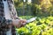 Farmer using digital tablet computer in cultivated agriculture F