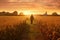 Farmer walking through corn field at sunrise