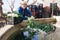 Farmer washes green onions before selling in market