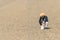 Farmer watching plowed field