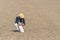 Farmer watching plowed field