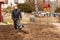 Farmer working in the field. Spring work on the farm. Man plowing the garden.