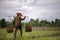 Farmers carry bamboo basket containing seedlings for planting