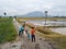 Farmers catch a fish in river at paddy field.