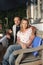 Farmers couple sitting at a wooden table