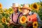 Farmers examine sunflower plant