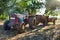 Farmers family with tractor