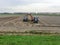 Farmers are harvesting potatoes in the dutch countryside in september