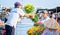 Farmers sell chrysanthemums on the river