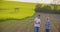 Farmers Talking While Walking On Agricultural Field