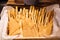 Farmhouse Freshly Baked Italian Styled Breadsticks Grissini Bread, pencil-sized sticks of crisp, dry baked bread. Food Staple