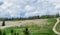 Farmhouse on a hill and clay road