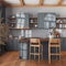 Farmhouse vintage wooden kitchen in gray and beige tones with island and stools. Parquet floor, shelves and cabinets. Colonial