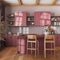 Farmhouse vintage wooden kitchen in red and beige tones with island and stools. Parquet floor, shelves and cabinets. Colonial