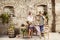 Farming couple making a toast with a glass of wine