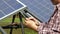 Farming man holding a tablet Used to control solar panels