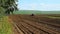 Farming. The Tractor Plows the Land.