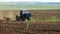 Farming. The Tractor Plows the Land.