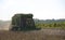 A Farming Tractors Gather Cotton