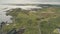 Farmland fields at pier cityscape. Rural road at seascape. Nobody nature landscape at pier city