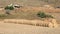 Farmland with hay bales after harvesting