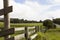 Farmland Pickett Fence Alongside Country Highway