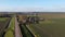 Farmland and road in Winter with landscape resting for the new season.