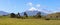 Farmland by snowcapped mount Taranaki foot, panorama