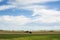 Farmland under blue sky and white cloud