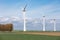 Farmland with wind turbines of the biggest windfarm in the Netherlands