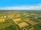 Farmlands. Rural landscape with bird`s eye view. Small farmland stretching to the horizon.