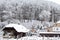 Farms and Farmhouses in the Snow. Windmill. Agriculture and Rural Life at Winter Background.