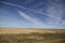 Farms and fields of Colorado, Kansas, Oklahoma, Missouri on a gloomy day with the blue sky