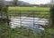 Farmyard gate with flooded field